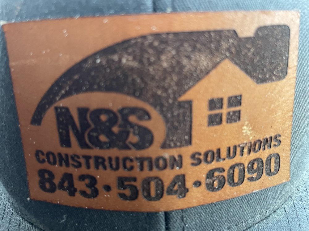 Slide of N&S Roofing