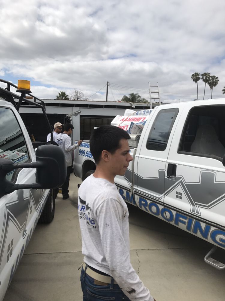 Slide of H&M ROOFING