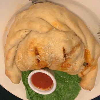 Table 59 - Meat Lovers Calzone! Also Great don't be afraid of the breading ! - Italian Near Me - Merced, California