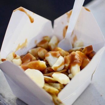 The American Poutine - a close up of a box of poutine - Food Trucks Near Me - Gilbert, Arizona