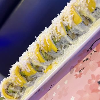 Kitsune Sushi House - The Hawaiian Roll. Wow, this roll was surprise! The fresh coconut to the sweet mango and the freshly fried shrimp tempura inside..get it - Sushi Bars Near Me - Clearwater, Florida