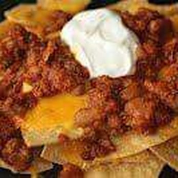Let's Go Mexican Food - Chili nachos: home made doritos topped with melted cheese and chili. - Mexican Near Me - São Roque, 20 Let's Go Mexican Food - Chili nachos: home made doritos topped with melted cheese and chili. - Mexican Near Me - São Roque, 20