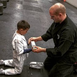 It may seem difficult at first, but everything is difficult at first. Congrats my son on your first belt ceremony!