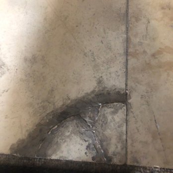 Real Property Management Corazon - Floor tiles in horrific condition. - Property Management Near Me - Reno, Nevada Real Property Management Corazon - Floor tiles in horrific condition. - Property Management Near Me - Reno, Nevada