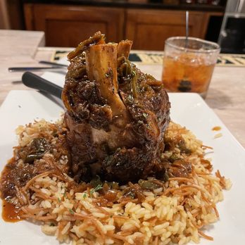 Community Restaurant - a plate of food with meat and rice - Greek Near Me - Cortland, New York
