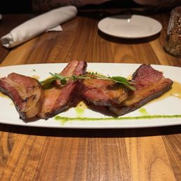 Nueske's Double Smoked Bacon. Really good but was also $25 for 4 slices of bacon. Nueske's Double Smoked Bacon. Really good but was also $25 for 4 slices of bacon.