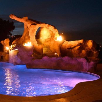 Je'Pierre - Residential waterfall, waterslide, fire holders, and a rope swing for a residential pool. - Pool & Hot Tub Service Near Me Je'Pierre - Residential waterfall, waterslide, fire holders, and a rope swing for a residential pool. - Pool & Hot Tub Service Near Me