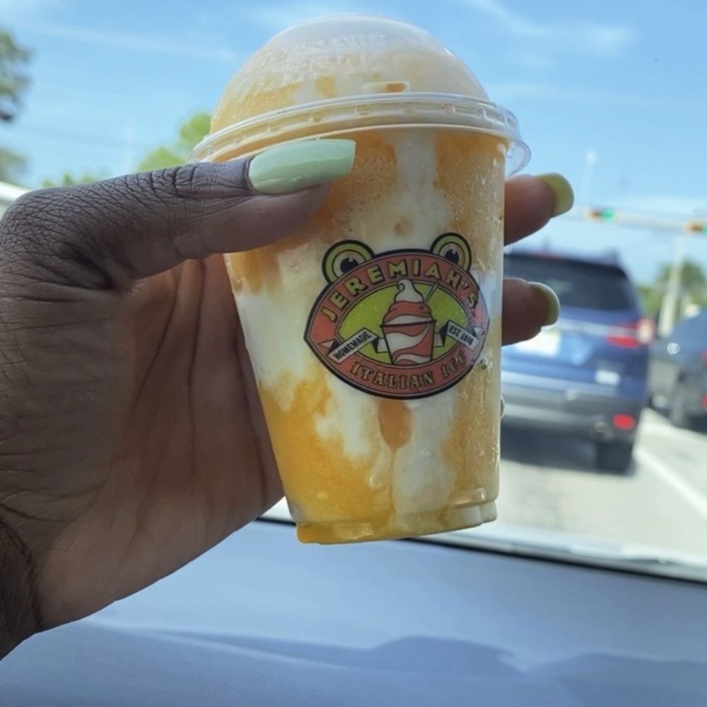 Jeremiah's Italian Ice - Mango Italian ice mixed with soft serve vanilla. Amazing combo! - Desserts Near Me - Cooper City, Florida Jeremiah's Italian Ice - Mango Italian ice mixed with soft serve vanilla. Amazing combo! - Desserts Near Me - Cooper City, Florida