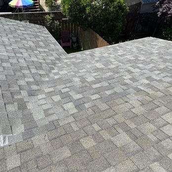 Astro Roofing - Brand new roof! Replaced the section that was leaking. Almost matches the shingles perfectly with the old 20 year old shingles - Roofing Near Me - Oakland, California