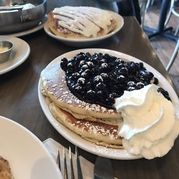 Buttermilk - Lemon Blueberry pancakes (Cinnamon Roll Pancakes in the background) - Coffee & Tea Near Me - Naperville, Illinois