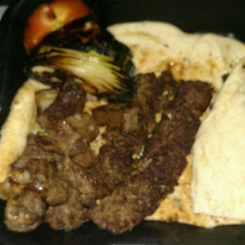 Saray Charcoal & Grill - Kafta kabobs, lamb kabobs, pita bread, BBQ tomato, and a grilled onion - Mediterranean Near Me - El Cajon, California Saray Charcoal & Grill - Kafta kabobs, lamb kabobs, pita bread, BBQ tomato, and a grilled onion - Mediterranean Near Me - El Cajon, California