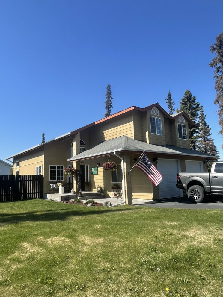 Slide of K-Bay Roofing