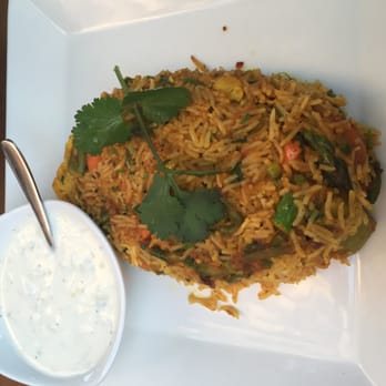 Lehja - Veggie Biryani w/cucumber yogurt sauce. LOVE that sauce!! - Indian Near Me - Richmond, Virginia Lehja - Veggie Biryani w/cucumber yogurt sauce. LOVE that sauce!! - Indian Near Me - Richmond, Virginia