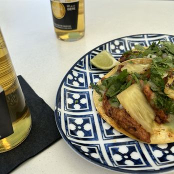 La Reina - Tacos al Pastor featuring pork and refreshing pineapple - Mexican Near Me - Guelph, Ontario