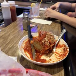 University at Larchmont Bar & Grill - 1/2 of my Hubbas "pizza" burger with meatballs..he liked it