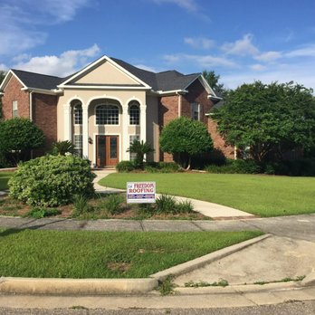 Freedom Roofing - a home with a for sale sign in front of it - Roofing Near Me - Mobile, Alabama Freedom Roofing - a home with a for sale sign in front of it - Roofing Near Me - Mobile, Alabama