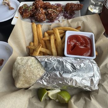 The Alibi Bar & Cafe - Halibut burrito Asian wings - Sports Bars Near Me - Homer, Alaska The Alibi Bar & Cafe - Halibut burrito Asian wings - Sports Bars Near Me - Homer, Alaska