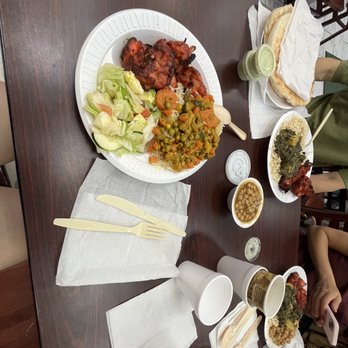 Kabob Palace - a table full of food - Afghan Near Me - Arlington, Virginia Kabob Palace - a table full of food - Afghan Near Me - Arlington, Virginia