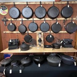 Yesteryear's Marketplace - Booth#53- wall full of cast iron