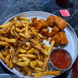Chicken bites and fries.