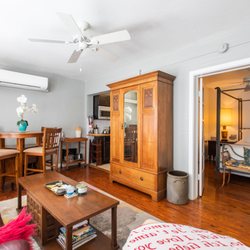 Burns Square Historic Vacation Rentals - The living room of the Orange Blossom Suite at Burns Square Historic Vacation Rentals.