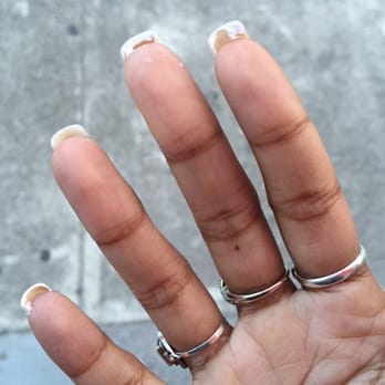Sunset Nails - Leftover polish under my nails when she sloppily redid them. - Nail Salons Near Me - San Francisco, California Sunset Nails - Leftover polish under my nails when she sloppily redid them. - Nail Salons Near Me - San Francisco, California