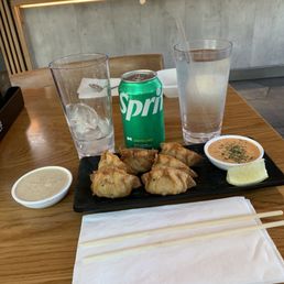Fried Gyoza 6 pieces . Served with 2 Sauces and Sprite Soft Drink. Fried Gyoza 6 pieces . Served with 2 Sauces and Sprite Soft Drink.