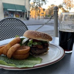 Pub Burger with Onion Rings and a Guinness on the patio