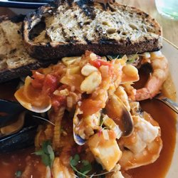Bills Fishhouse + Bar - Cioppino ... prawns, fish, mussels, pipis .. and a crusty piece of sourdough (I think). Very filling and extremely tasty.