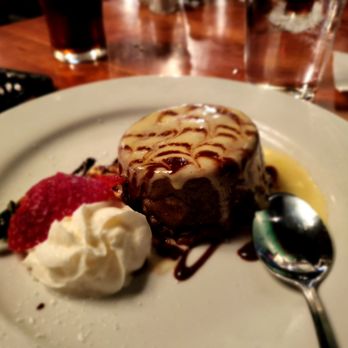 Boars Head Grill - Flourless Chocolate Torte
Rich, dense chocolate cake with fresh raspberry sauce - Seafood Near Me - Savannah, Georgia Boars Head Grill - Flourless Chocolate Torte
Rich, dense chocolate cake with fresh raspberry sauce - Seafood Near Me - Savannah, Georgia