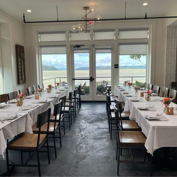 Bella Siena - Beautiful view of the water amidst our dining tables with fresh crisp white linens. - Italian Near Me - Benicia, California