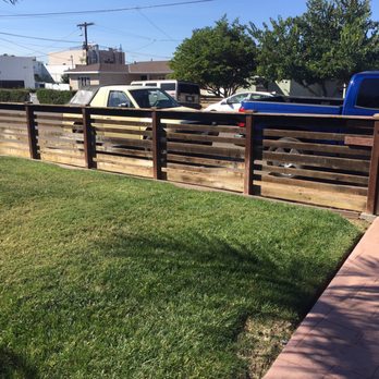 Zurteck Remodeling - Old fence before revival - General Contractors Near Me