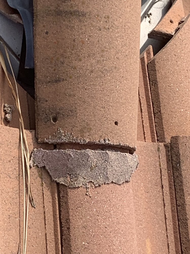 Slide of M G Roofing