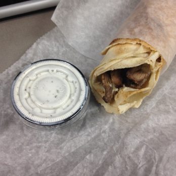 Muncheez Truck - Beef shawarma wrap with yogurt sauce on the side - Food Trucks Near Me Muncheez Truck - Beef shawarma wrap with yogurt sauce on the side - Food Trucks Near Me