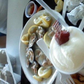 Johnny's Reef Restaurant - Clams with lemons hot sauce, frozen drinks - Seafood Near Me - Bronx, New York Johnny's Reef Restaurant - Clams with lemons hot sauce, frozen drinks - Seafood Near Me - Bronx, New York
