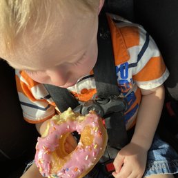Smashed strawberry frosted donut. Smashed strawberry frosted donut.