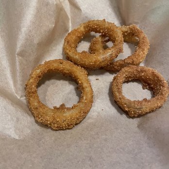 Islands Restaurant - Side of onion rings! Ridiculous portion. says it comes with 6 and we got 5 (pic only shows 4 because my son grabbed 1 before I took pic) - Burgers Near Me - Fullerton, California Islands Restaurant - Side of onion rings! Ridiculous portion. says it comes with 6 and we got 5 (pic only shows 4 because my son grabbed 1 before I took pic) - Burgers Near Me - Fullerton, California