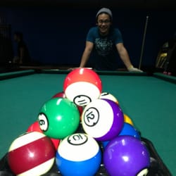 Lucky Star Billiards - He is having fun playing pool...:-)