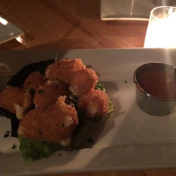 The Abbey - Fried cheese curds with a tomato sirracha dipping sauce - New American Near Me - Brookline, Massachusetts The Abbey - Fried cheese curds with a tomato sirracha dipping sauce - New American Near Me - Brookline, Massachusetts