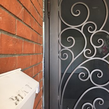 Iron Door Concepts - Exposing wood and waterproof paper. - Fences & Gates Near Me - Santa Ana, California Iron Door Concepts - Exposing wood and waterproof paper. - Fences & Gates Near Me - Santa Ana, California