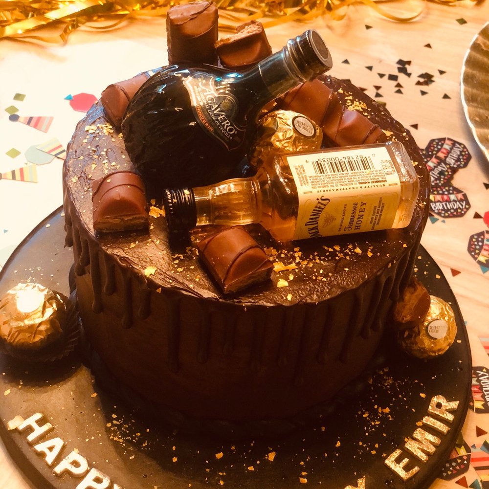 Banoo Bakery - a chocolate birthday cake with a bottle of liquor - Custom Cakes Near Me - Mission Viejo, California Banoo Bakery - a chocolate birthday cake with a bottle of liquor - Custom Cakes Near Me - Mission Viejo, California