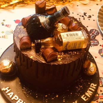 Banoo Bakery - a chocolate birthday cake with a bottle of liquor - Custom Cakes Near Me - Mission Viejo, California