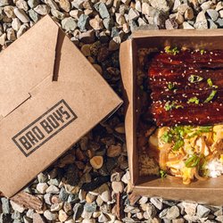 Bao Boys - The Don Belly: Chashu Pork Belly, Japanese-style poached egg, dashi broth with onion, green onion, sesame. Served over steamed rice.
