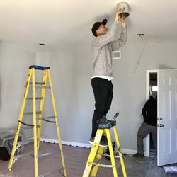 Creative Lighting Solutions - Cutout Sheetrock for wires, cans and switches. Install another switch and make them turn on/off lights from two locations.