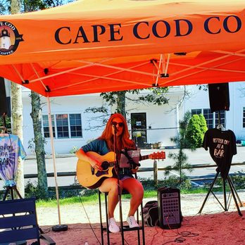 Cape Cod Coffee - Carly Tefft singing at the outdoor seating area. - Coffee & Tea Near Me - Mashpee, Massachusetts