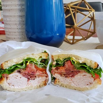 Big Front Door - The Club is made with fresh thick-cut turkey and bacon, delicious veggies, and toasted sourdough. - Delis Near Me - San Diego, California