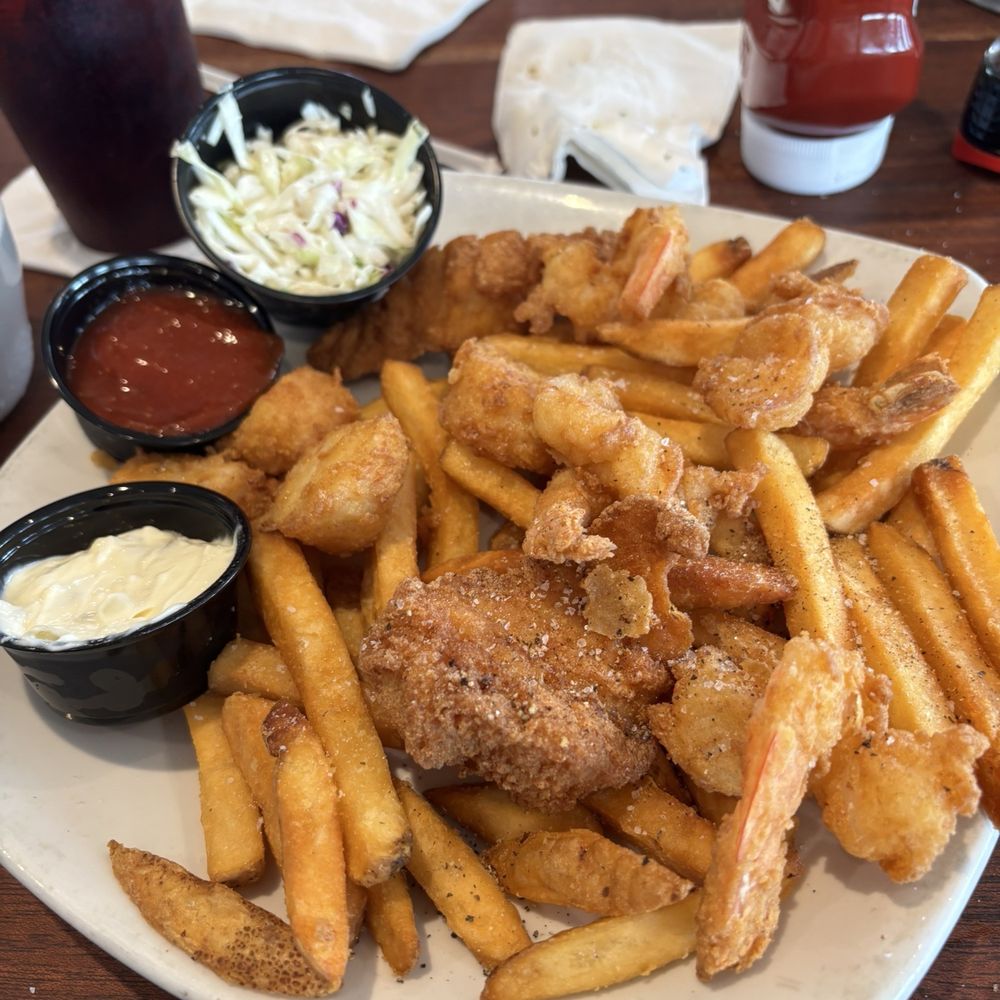 Salt Life Food Shack - Captains platter. Note how much darker the fish was... not to harp on it but $4 to replace burnt fish? - Seafood Near Me - St. Augustine Beach, Florida