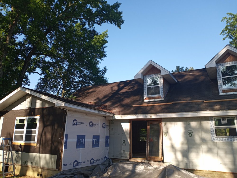 Slide of R and R Roofing Services