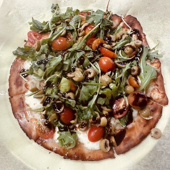 Bravo Pizza Plus - Gluten free crust with arugula, feta, mozzarella, green olives, tomatoes and balsamic vinaigrette at Bravo Pizza - Pizza Near Me - Atascadero, California Bravo Pizza Plus - Gluten free crust with arugula, feta, mozzarella, green olives, tomatoes and balsamic vinaigrette at Bravo Pizza - Pizza Near Me - Atascadero, California
