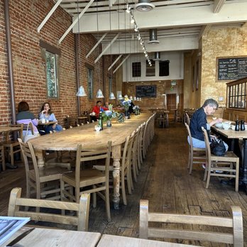 Le Pain Quotidien - There is a fantastic large community table in the middle of the restaurant - Bakeries Near Me - Beverly Hills, California Le Pain Quotidien - There is a fantastic large community table in the middle of the restaurant - Bakeries Near Me - Beverly Hills, California